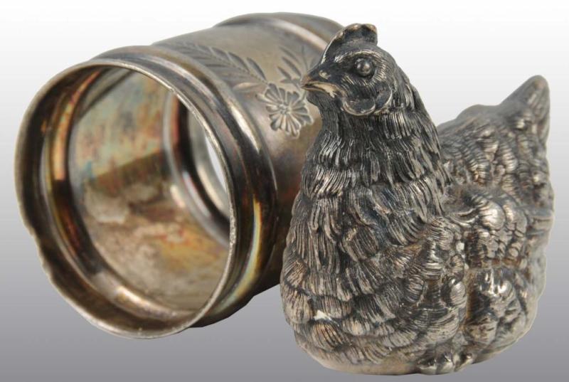 Appraisal: Sitting Hen Figural Napkin Ring Description Meriden Condition Excellent