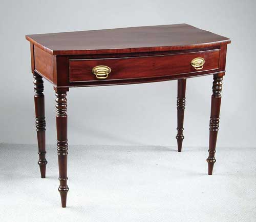 Appraisal: ONE DRAWER MAHOGANY BOWFRONT DRESSING TABLE Ring turned legs support