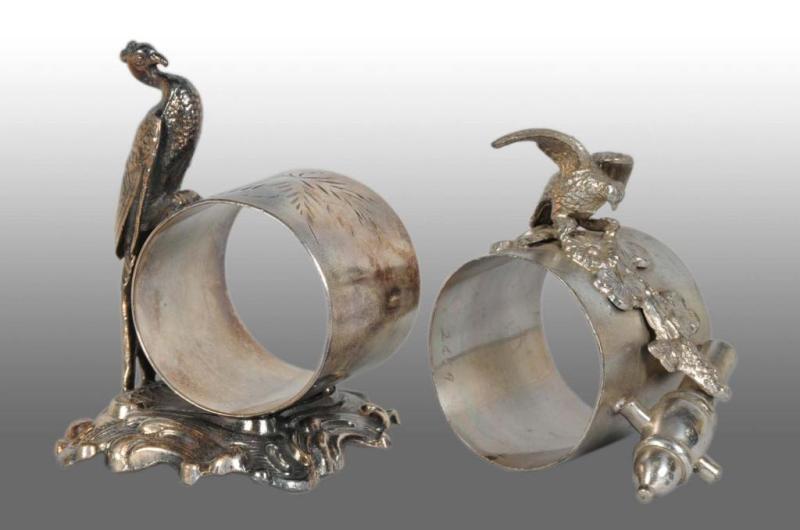 Appraisal: Lot of Figural Napkin Rings Description Includes a peacock on