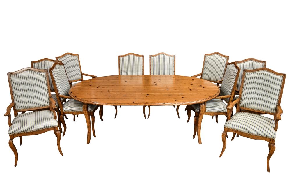 Appraisal: GEORGIAN STYLE CARVED PINE DINING TABLE TEN CHAIRSCondition with a