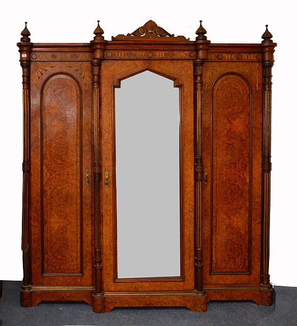 Appraisal: A VICTORIAN BURR WALNUT BREAK FRONT WARDROBE the central mirrored