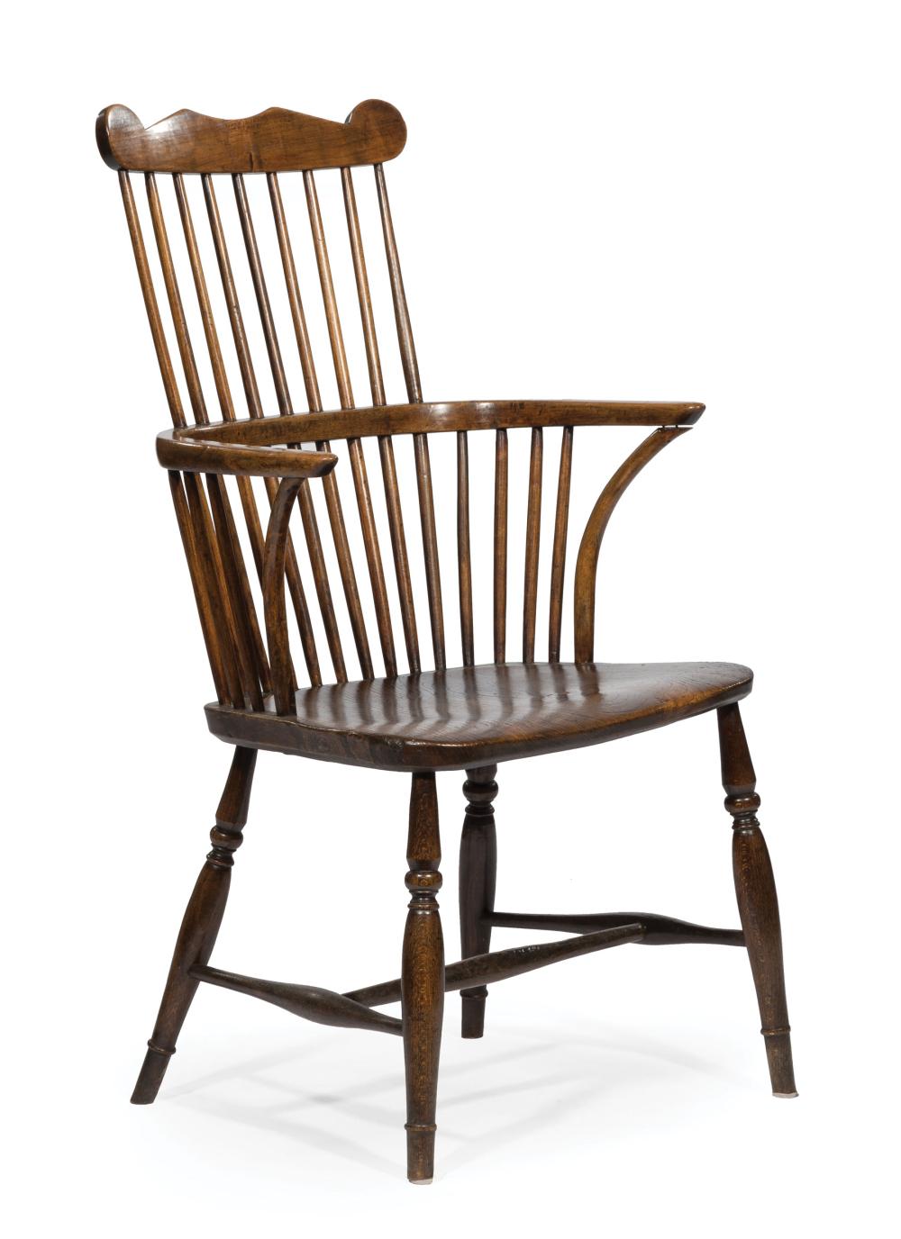 Appraisal: English Comb-Back Elm Windsor Chair spindled supports plank seat bulbous