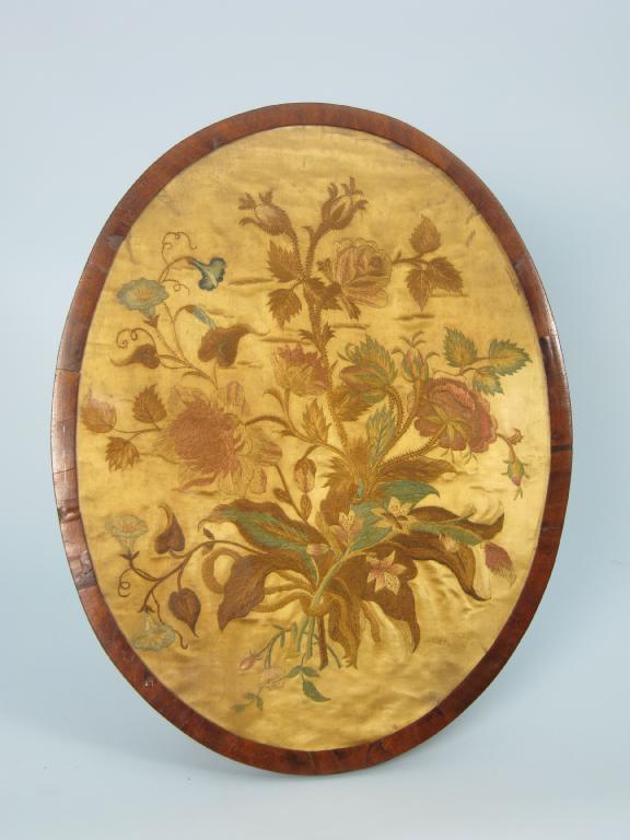 Appraisal: An early th Century oval silk work Panel of flowers