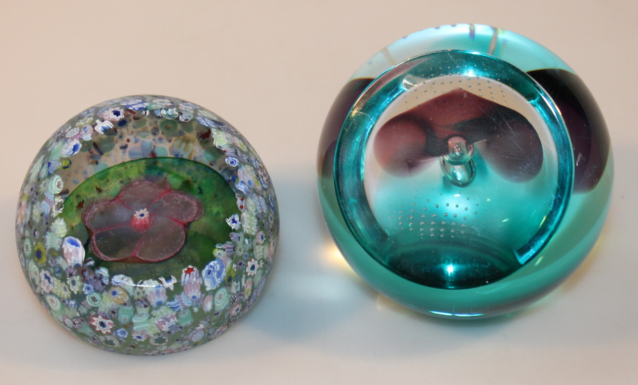 Appraisal: A th Caithness Slipstream paperweight cm high and another Mille