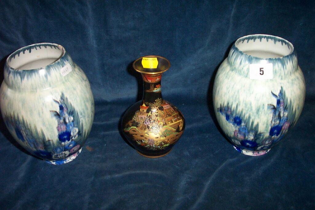 Appraisal: A pair of Carlton ware vases with painted blue and