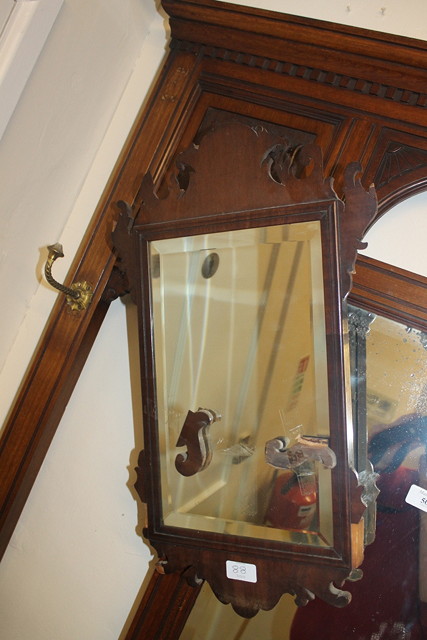 Appraisal: A GEORGE III MAHOGANY SMALL FRET WALL MIRROR with bevel