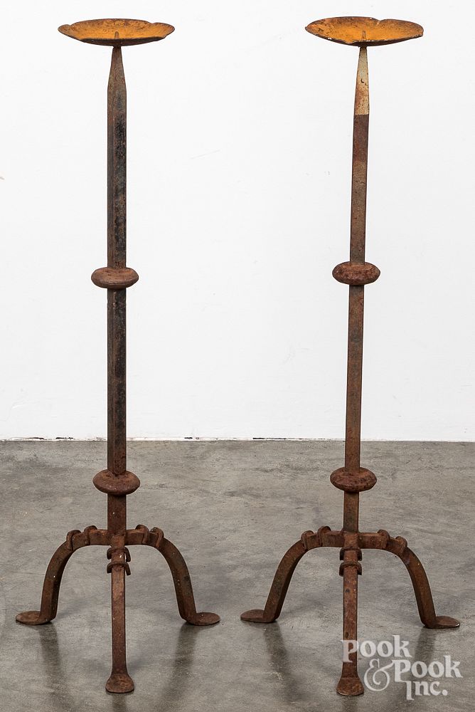 Appraisal: Large pair of iron pricket candlesticks th c Large pair