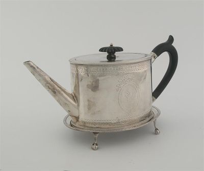 Appraisal: A George III oval teapot and matching stand with bead