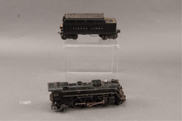 Appraisal: Lionel Locomotive and Whistle Tender To include pieces Lionel Locomotive