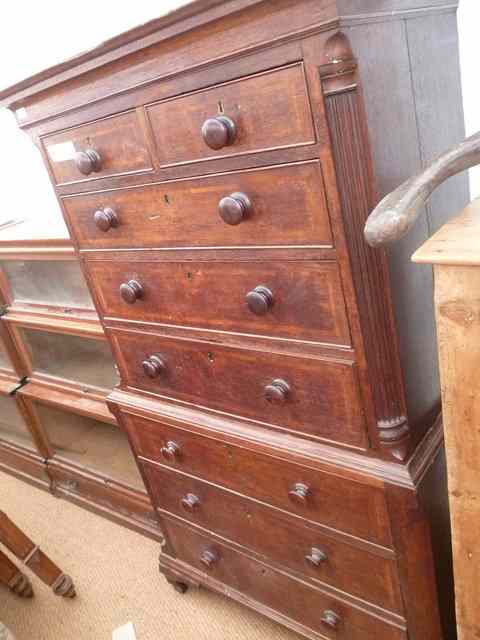 Appraisal: A GEORGIAN OAK SMALL CHEST ON CHEST the drawers with