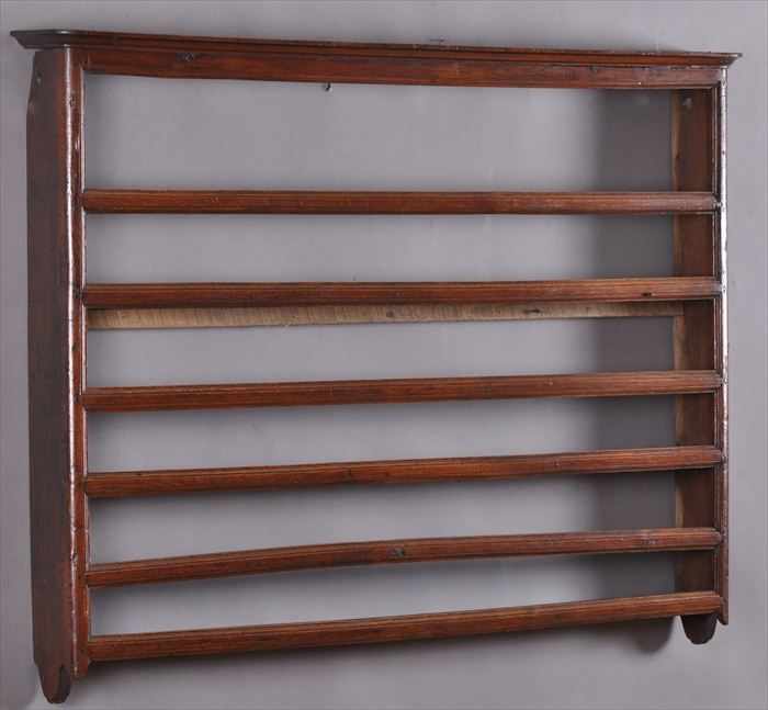 Appraisal: ENGLISH OAK HANGING SHELF The molded cornice inscribed underneath above