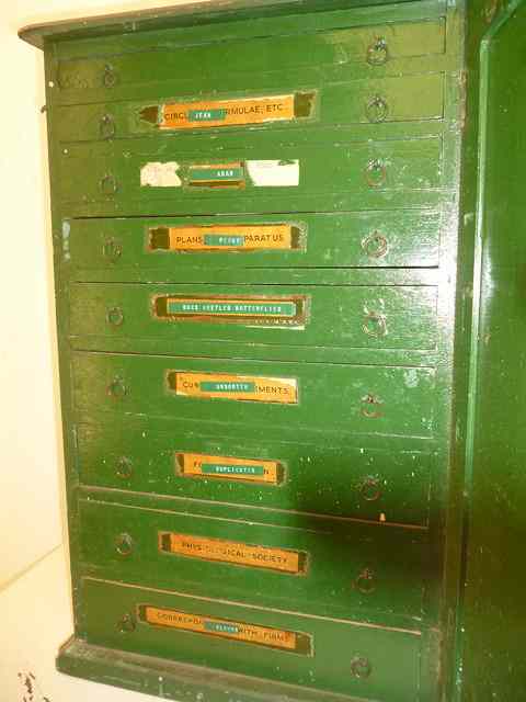 Appraisal: A VICTORIAN GREEN PAINTED PINE COLLECTORS CABINET the interior fitted