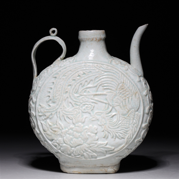 Appraisal: Chinese Yuan Dynasty Qingbai glazed moon form ewer each side