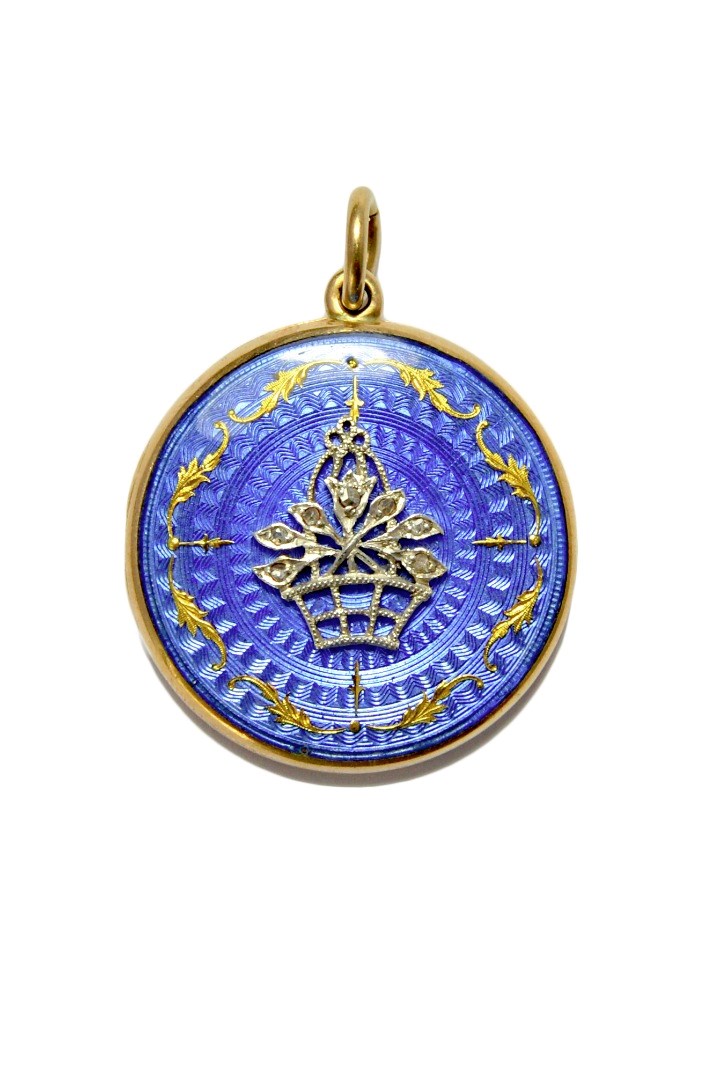 Appraisal: A pale blue enamelled and rose diamond set circular pendant