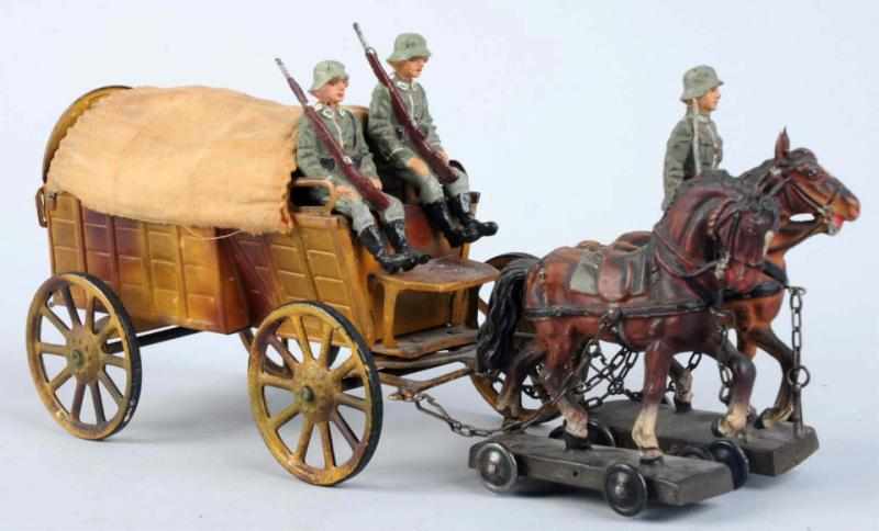 Appraisal: Lineol cm Camouflage Supply Wagon Tinplate wagon with composition horses