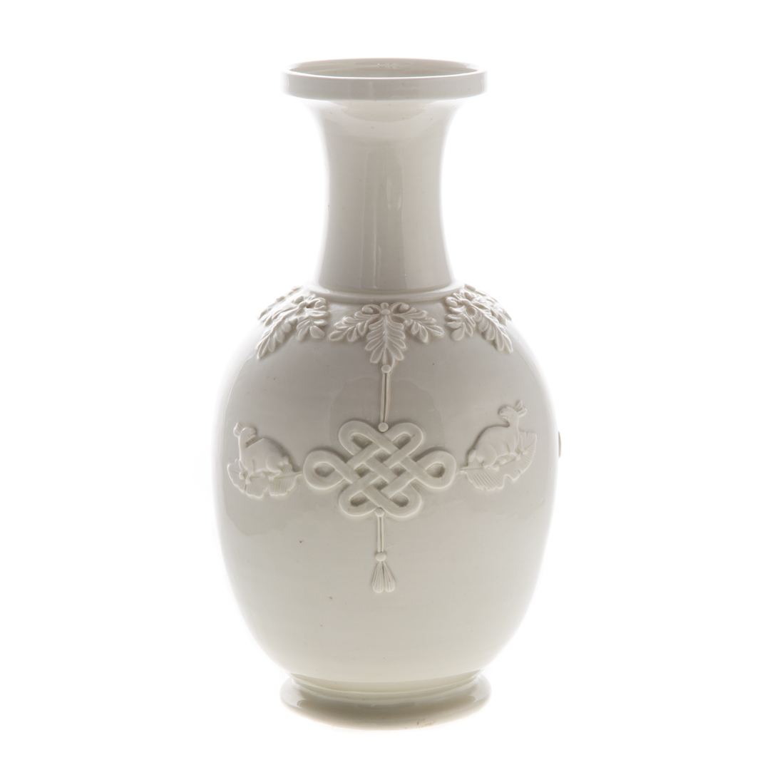 Appraisal: Chinese blanc de chine porcelain vase with relief dragon and