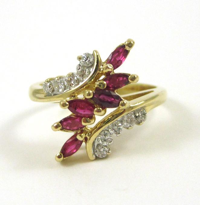 Appraisal: RUBY DIAMOND AND FOURTEEN KARAT GOLD RING set with six