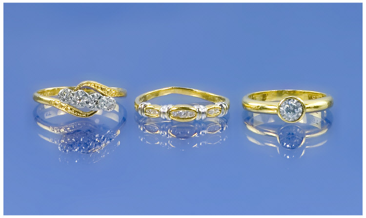 Appraisal: Three ct Gold Diamond Rings Comprising Single Stone Four Stone