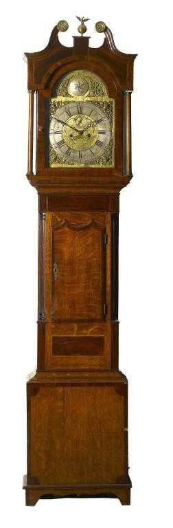 Appraisal: A GEORGE III OAK LONGCASE CLOCK the brass break-arched dial