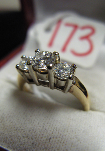 Appraisal: DIAMOND AND FOURTEEN YELLOW AND WHITE GOLD THREE STONE RING