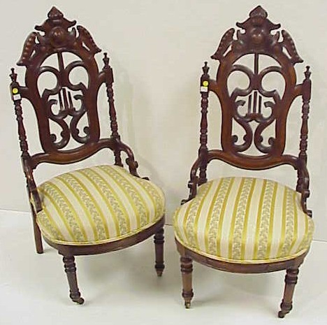 Appraisal: Two th C Renaissance Revival side chairs carved arched crests