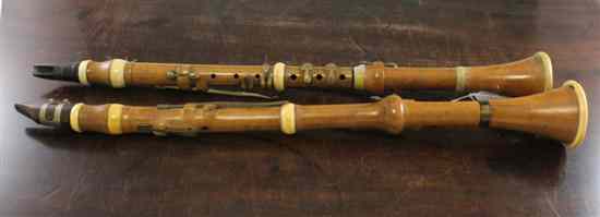 Appraisal: A th century ivory mounted maple clarinet by E Lamb