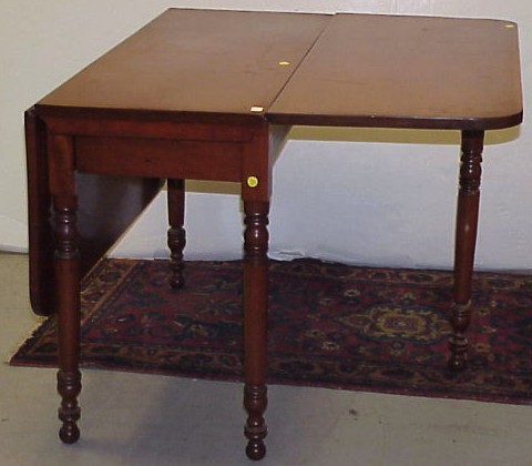 Appraisal: Early th C drop-leaf dining table cherry oblong top oblong