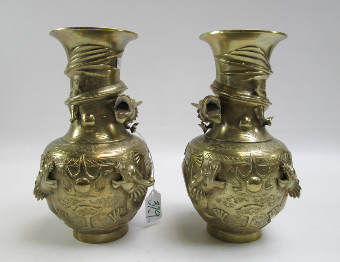 Appraisal: PAIR CHINESE BRASS VASES of bottle form with flared rim