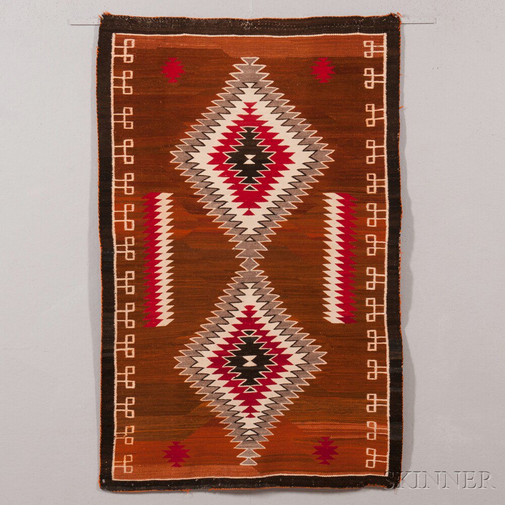 Appraisal: Navajo Regional Rug with two concentric serrate-edge diamonds on a