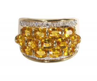 Appraisal: Yellow sapphire diamond and k yellow gold ring Yellow sapphire