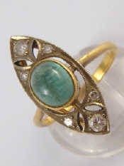 Appraisal: A yellow metal tests carat gold cabochon emerald and diamond