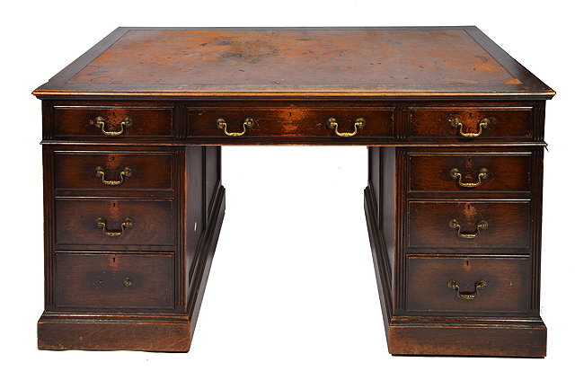 Appraisal: AN OAK PEDESTAL DESK with leather inset top cm wide