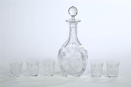 Appraisal: CUT GLASS DECANTER SET The decanter has finely cut decoration