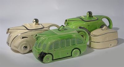 Appraisal: Two 'OKT ' novelty teapots modelled as cars glazed in