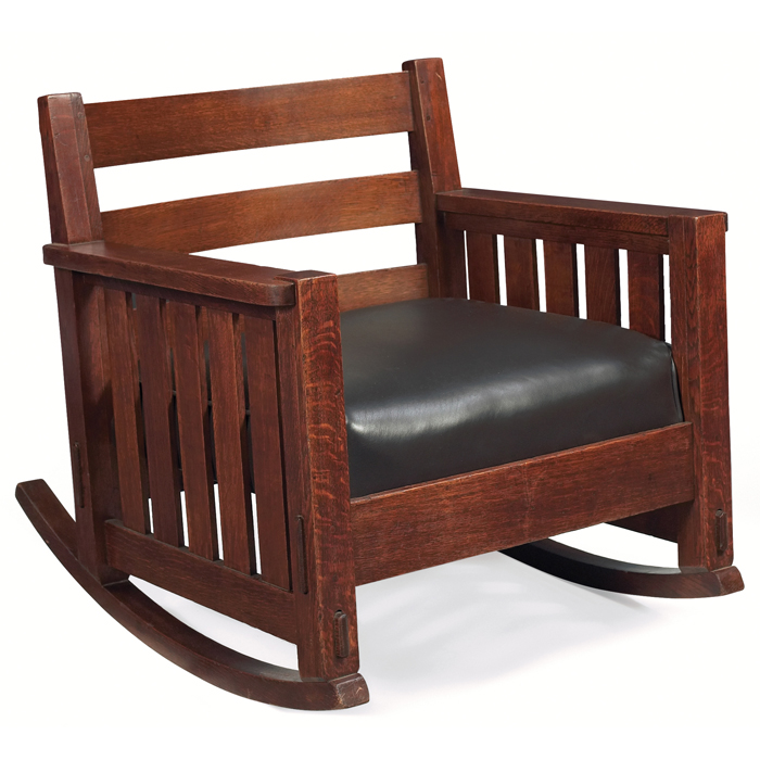 Appraisal: Charles Stickley rocker wide form with horizontal slats at back