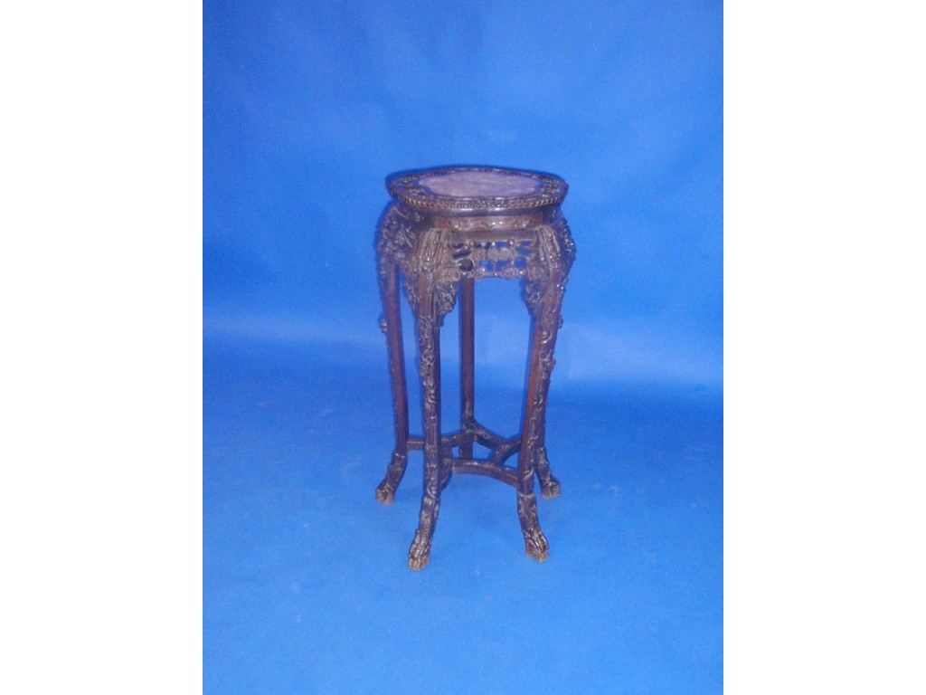 Appraisal: A Chinese carved rosewood jardiniere stand with marble inset top