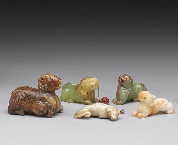 Appraisal: Five nephrite and serpentine animal studies Including a mottled celadon