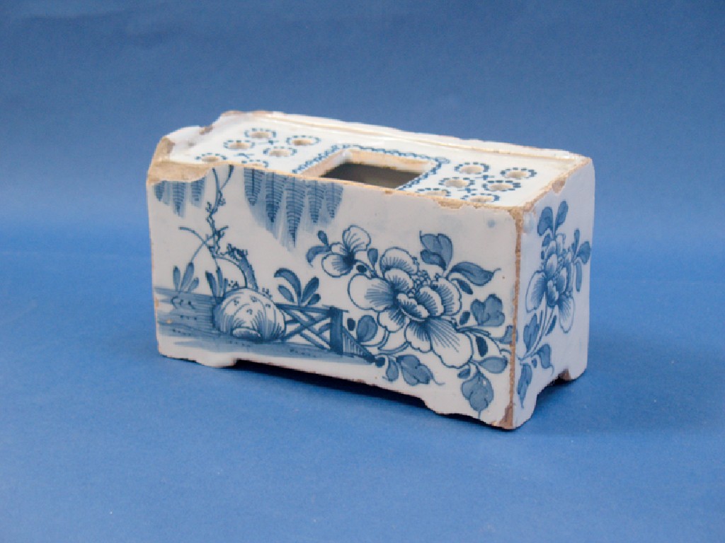 Appraisal: A DELFTWARE BLUE AND WHITE FLOWER BRICK th century on