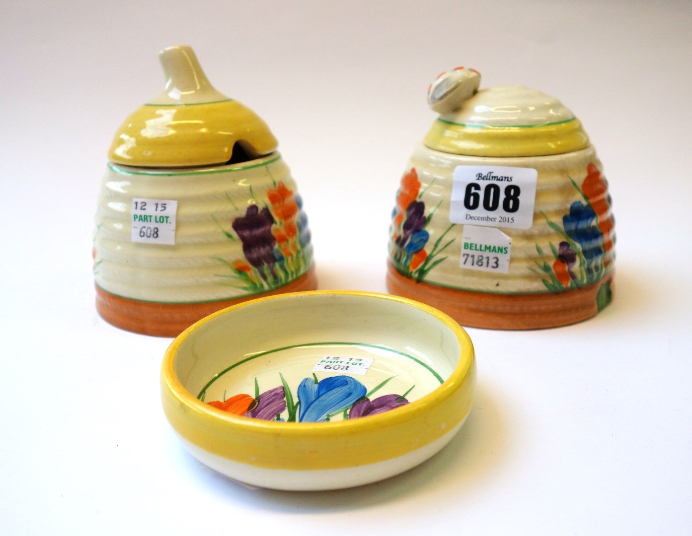 Appraisal: A Clarice Cliff 'Beehive' preserve pot and cover circa decorated