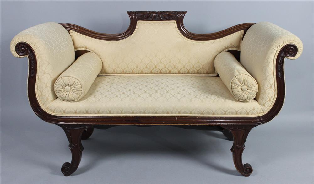 Appraisal: CLASSICAL REVIVAL CARVED SETTEE having a carved and shaped crest