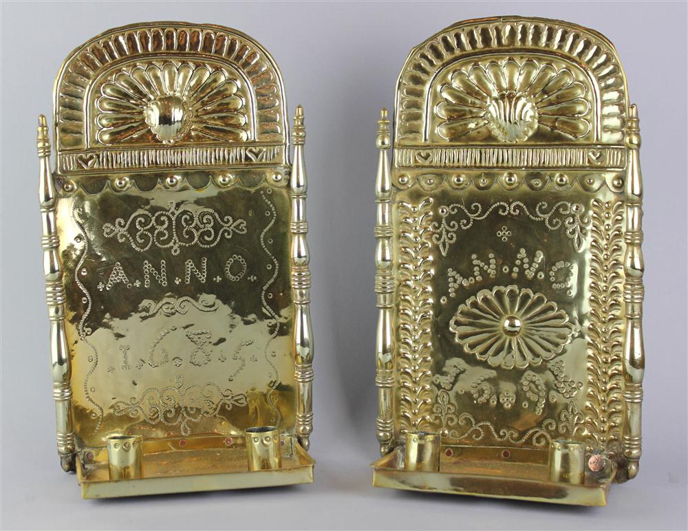 Appraisal: TWO DUTCH DATED BRASS WALL LIGHTS and respectively both with