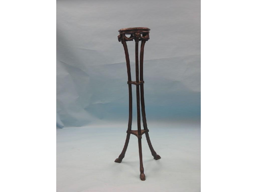 Appraisal: An early th century mahogany urn stand circular top above