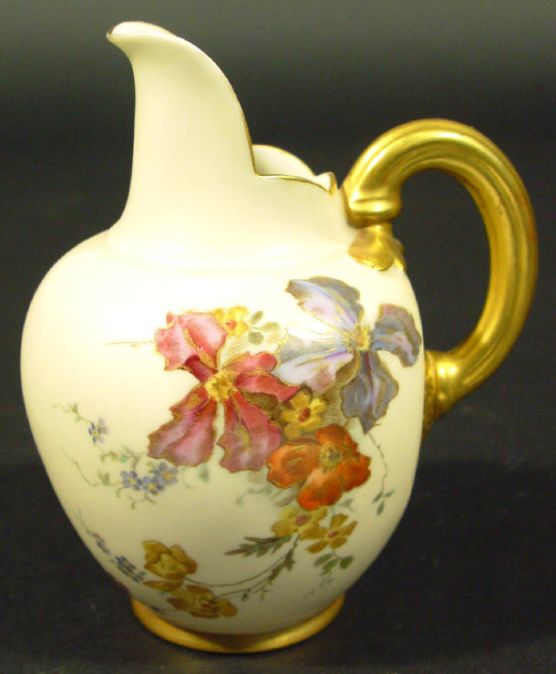 Appraisal: Royal Worcester china jug hand painted and gilded with flowers