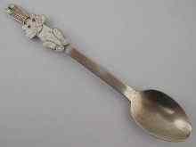 Appraisal: An Estonian silver child's spoon with enamelled rabbit terminal Soviet