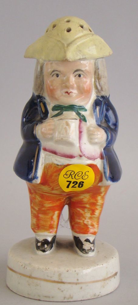 Appraisal: ANTIQUE POLYCHROME STAFFORDSHIRE TOBY PEPPER POT th CenturyWith unusually placed