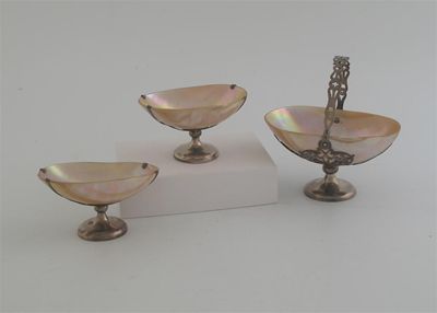 Appraisal: A suite of one large and two smaller mounted shell