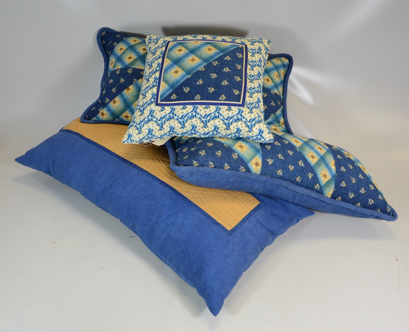 Appraisal: Throw pillows made from patchwork quilts largest approx x RCA