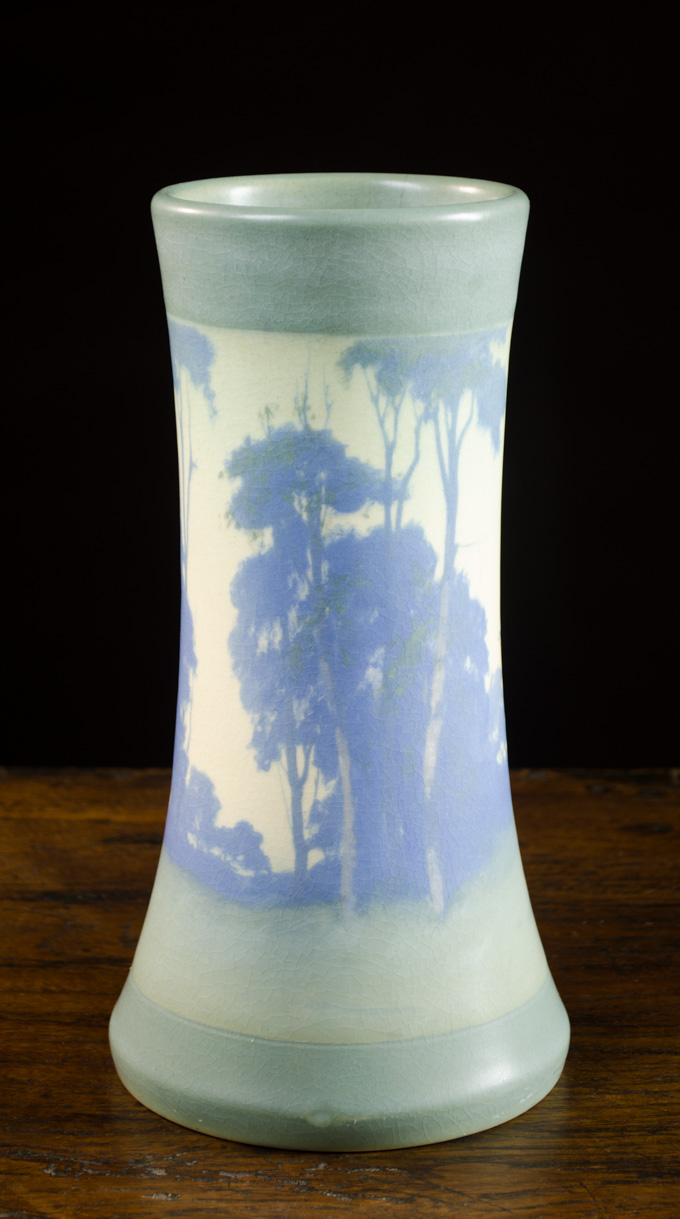 Appraisal: ROOKWOOD POTTERY VELLUM GLAZED LANDSCAPE VASE shape C with tapered