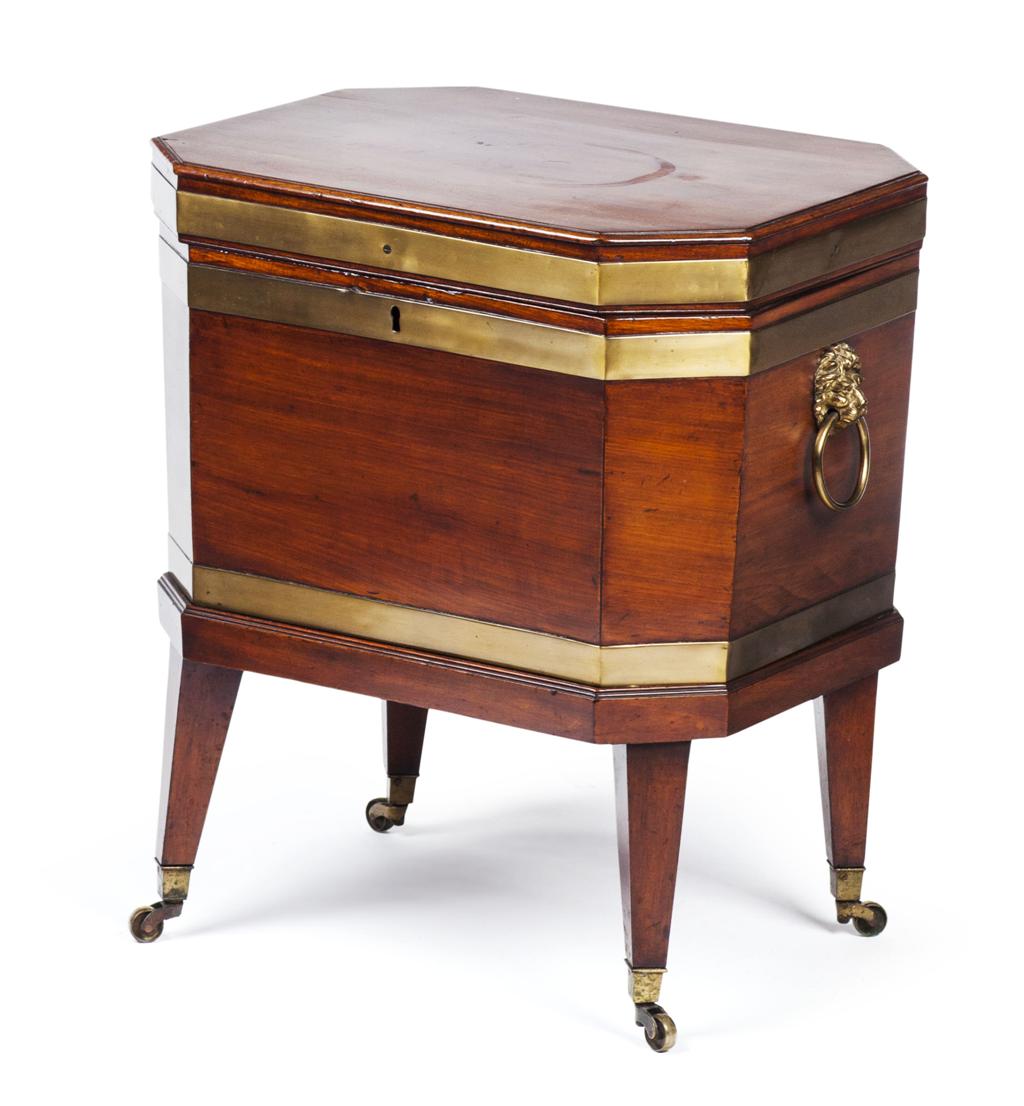 Appraisal: GEORGE III MAHOGANY AND BRASS BOUND CELLARETTE CIRCA the octagonal