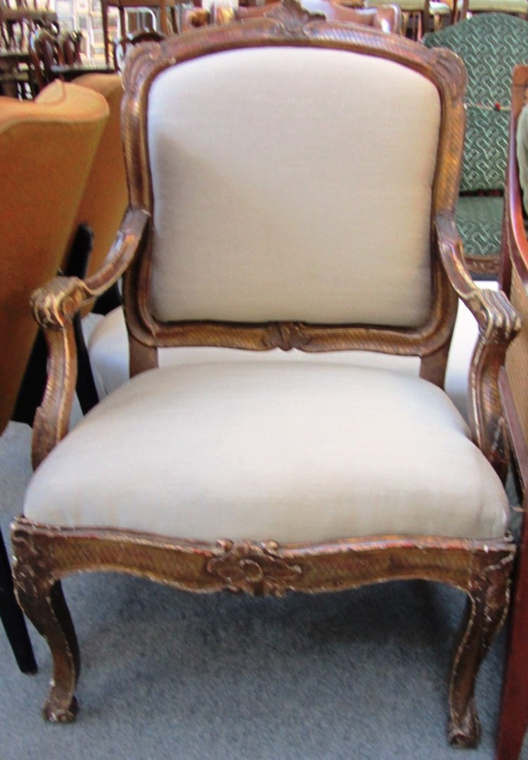 Appraisal: A th century French gilt framed armchair with serpentine seat